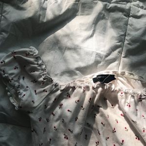 rose detailing off the shoulder top🌹